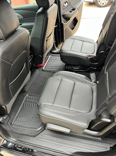 The back seats of a car are empty